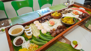 The Taal Boodle is served with Pork Adobo sa Dilaw, Tapang Taal, and Longganisang Taal