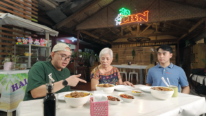 Lola Lucia Olan and her grandson Maralit Juan Paolo Olan recounting the story of their lomi house